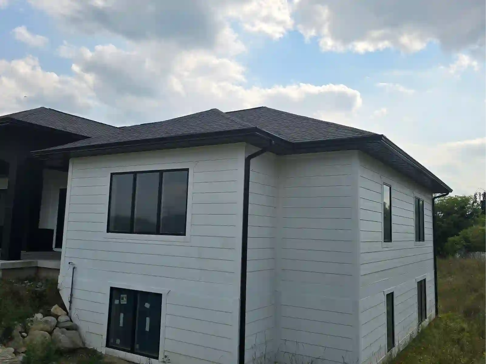 White siding on a modern two-story home